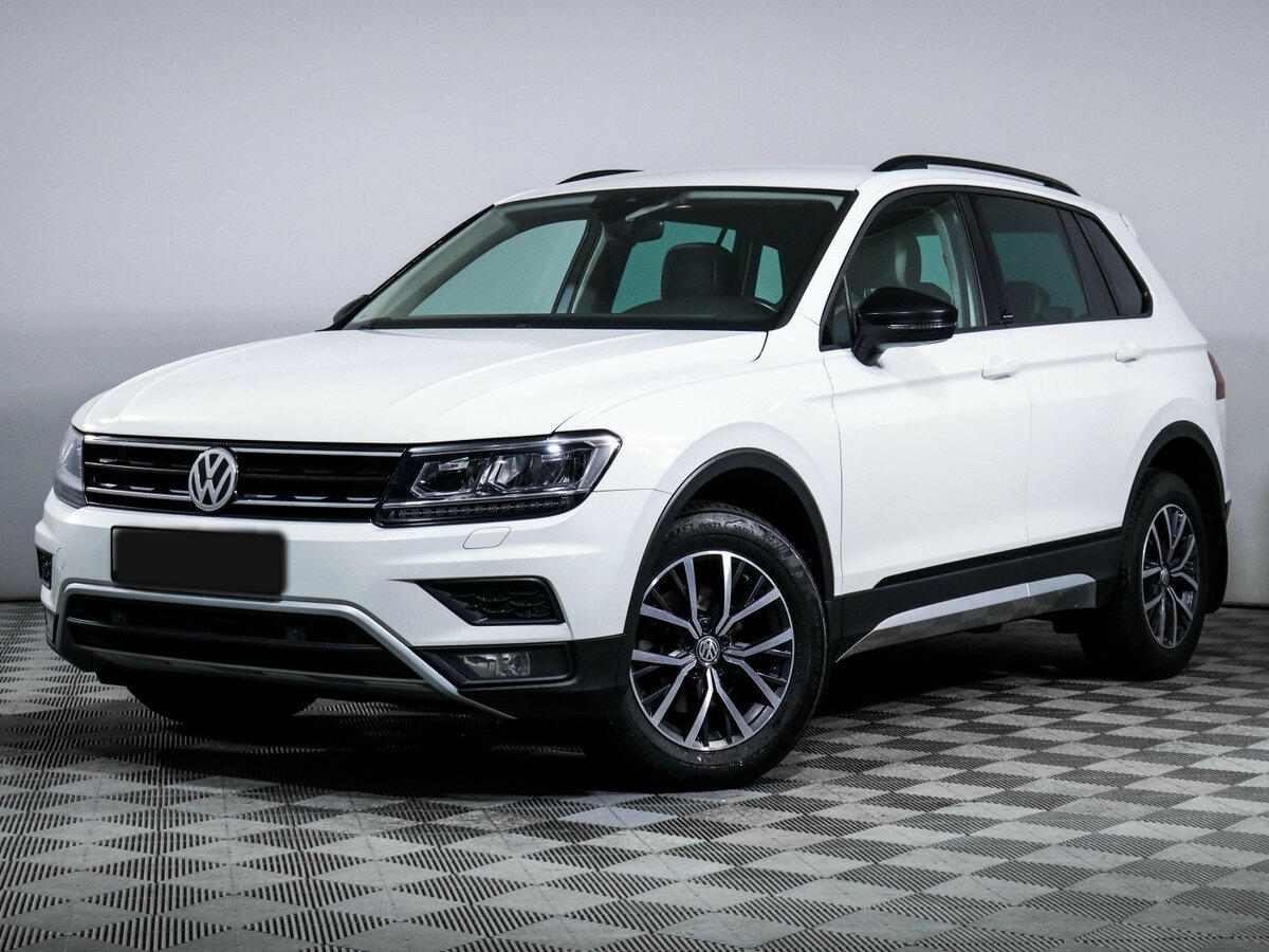 Купить Volkswagen Tiguan с пробегом. Посмотреть фото