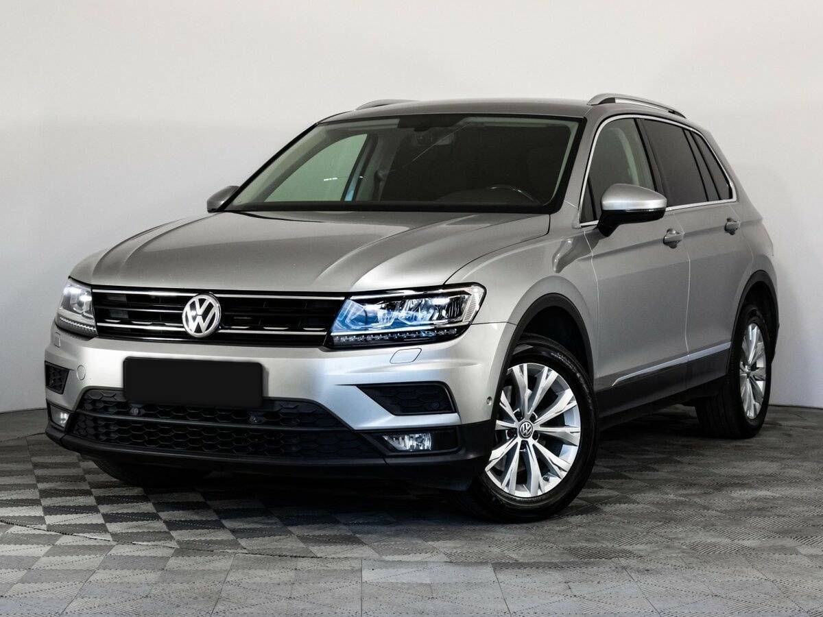 Купить Volkswagen Tiguan с пробегом. Посмотреть фото