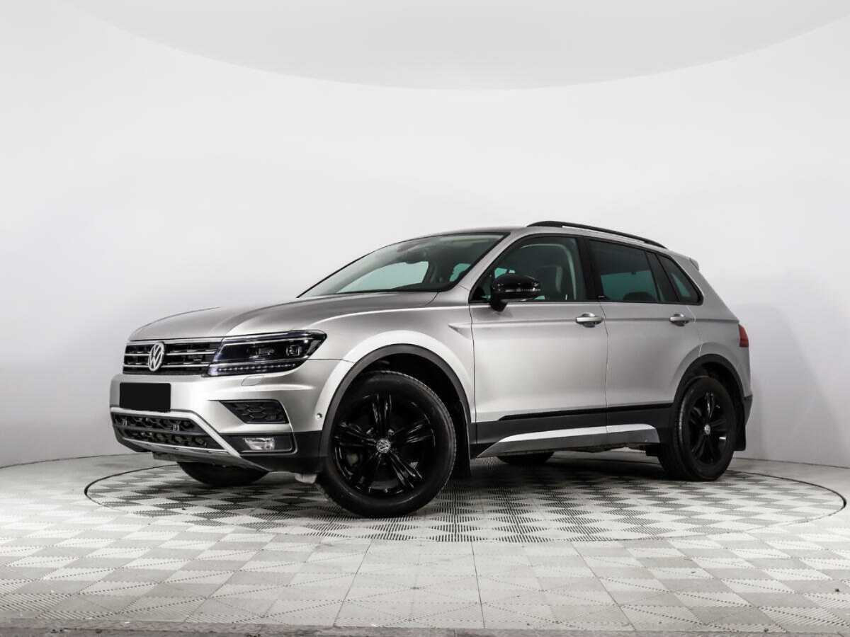 Купить Volkswagen Tiguan с пробегом. Посмотреть фото