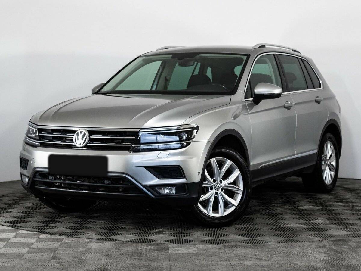 Купить Volkswagen Tiguan с пробегом. Посмотреть фото
