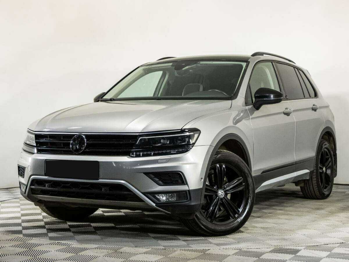 Купить Volkswagen Tiguan с пробегом. Посмотреть фото