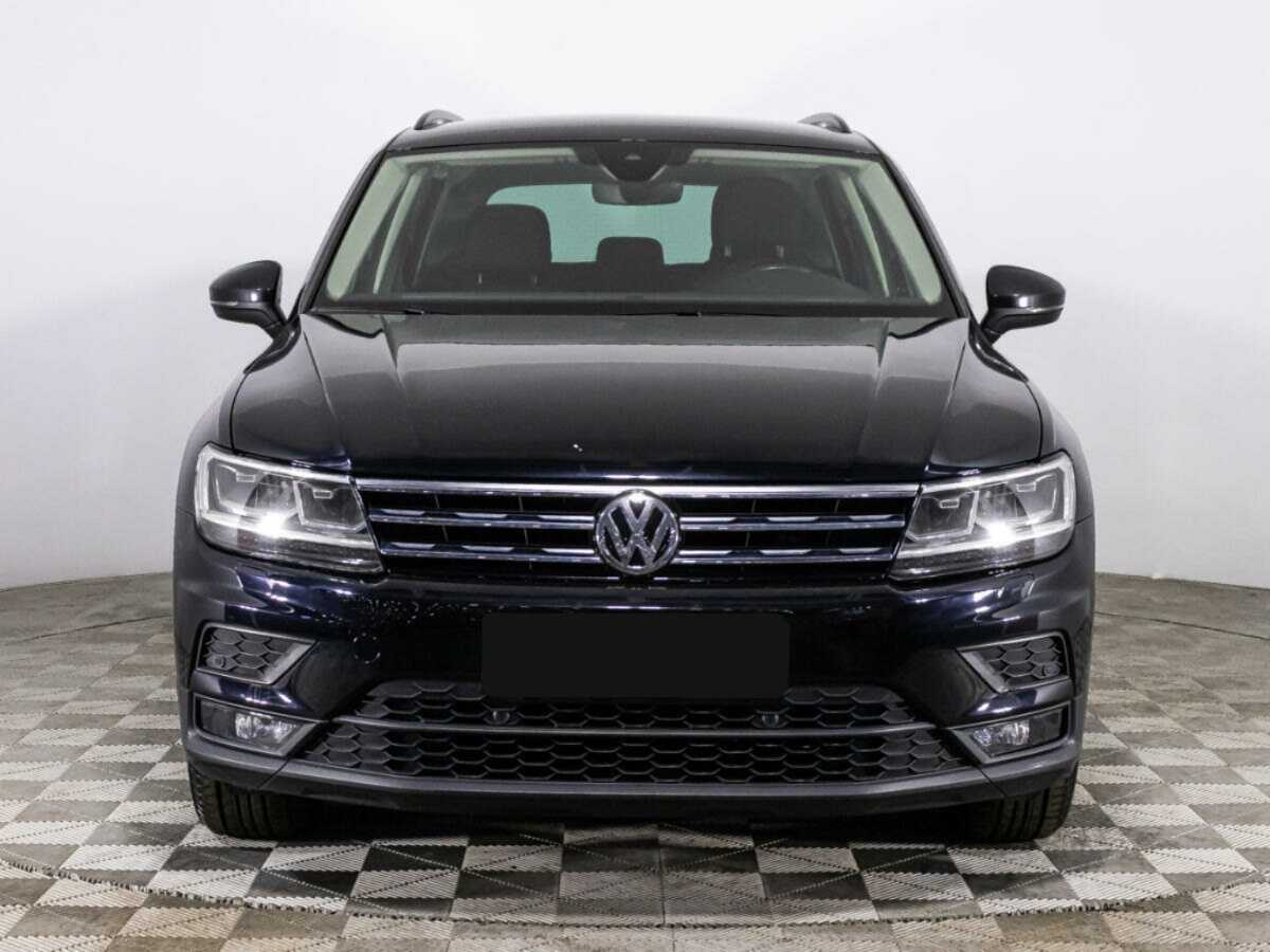 Купить Volkswagen Tiguan с пробегом. Посмотреть фото