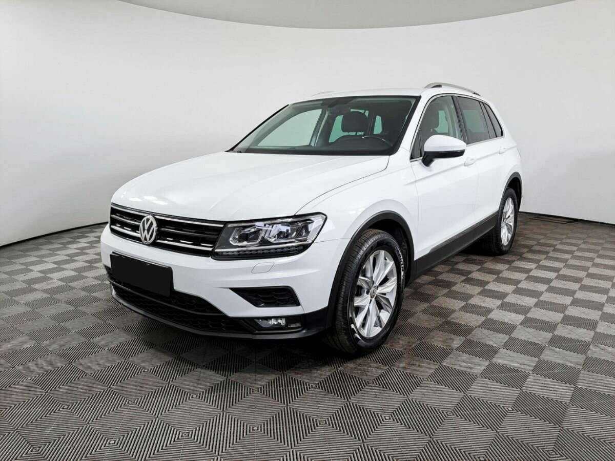 Купить Volkswagen Tiguan с пробегом. Посмотреть фото