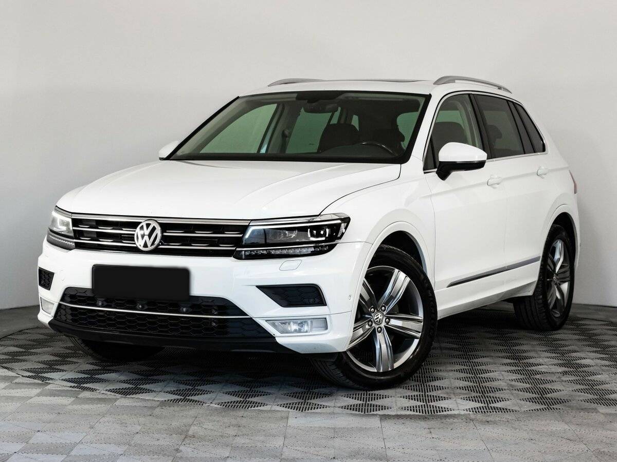 Купить Volkswagen Tiguan с пробегом. Посмотреть фото