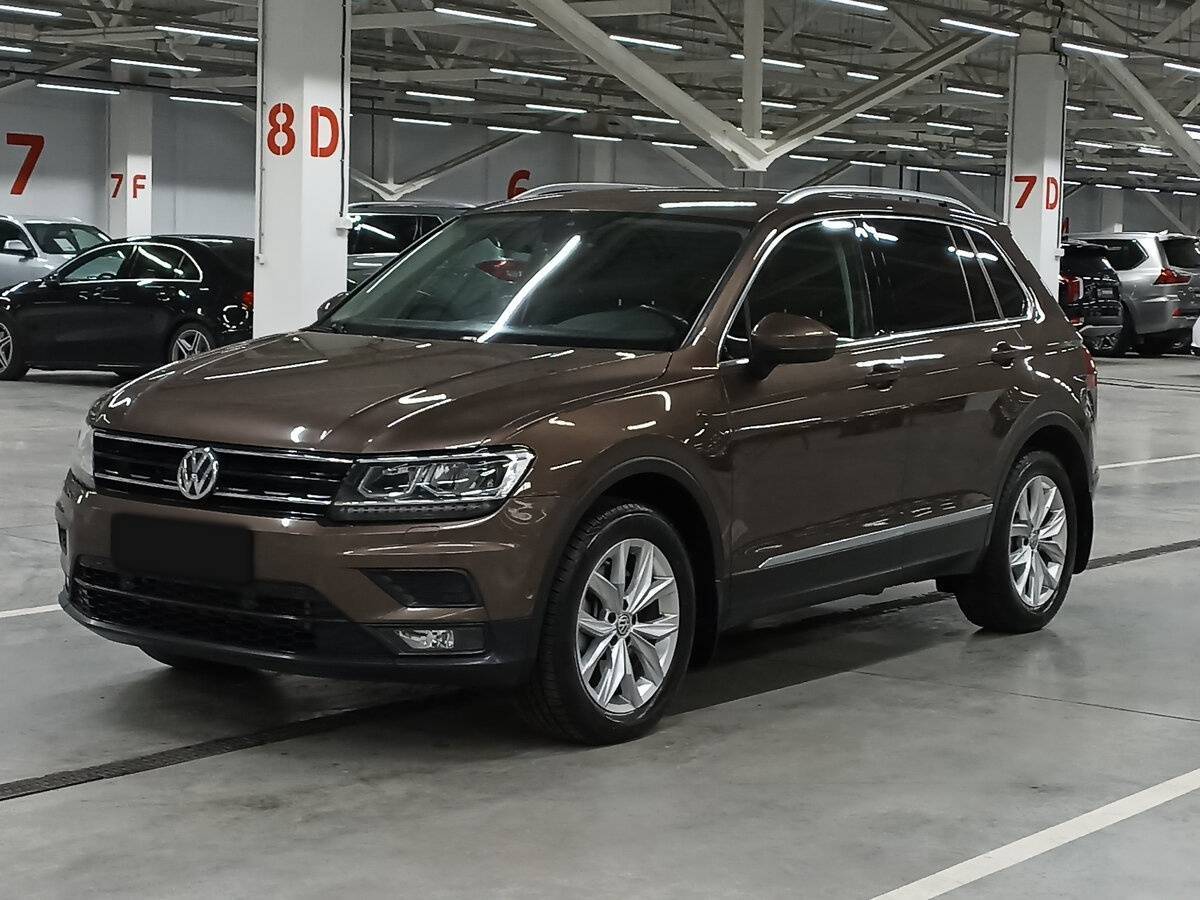 Купить Volkswagen Tiguan с пробегом. Посмотреть фото