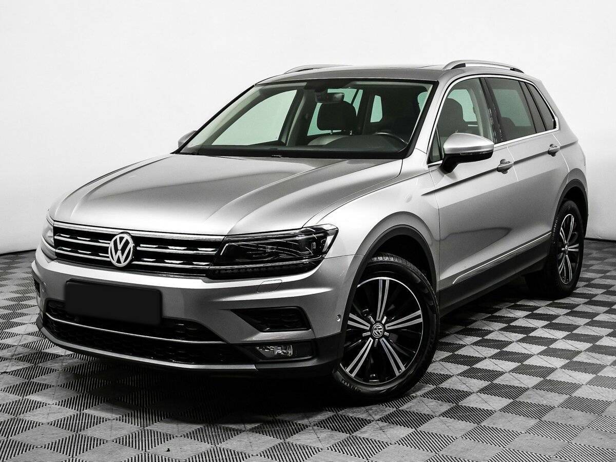 Купить Volkswagen Tiguan с пробегом. Посмотреть фото