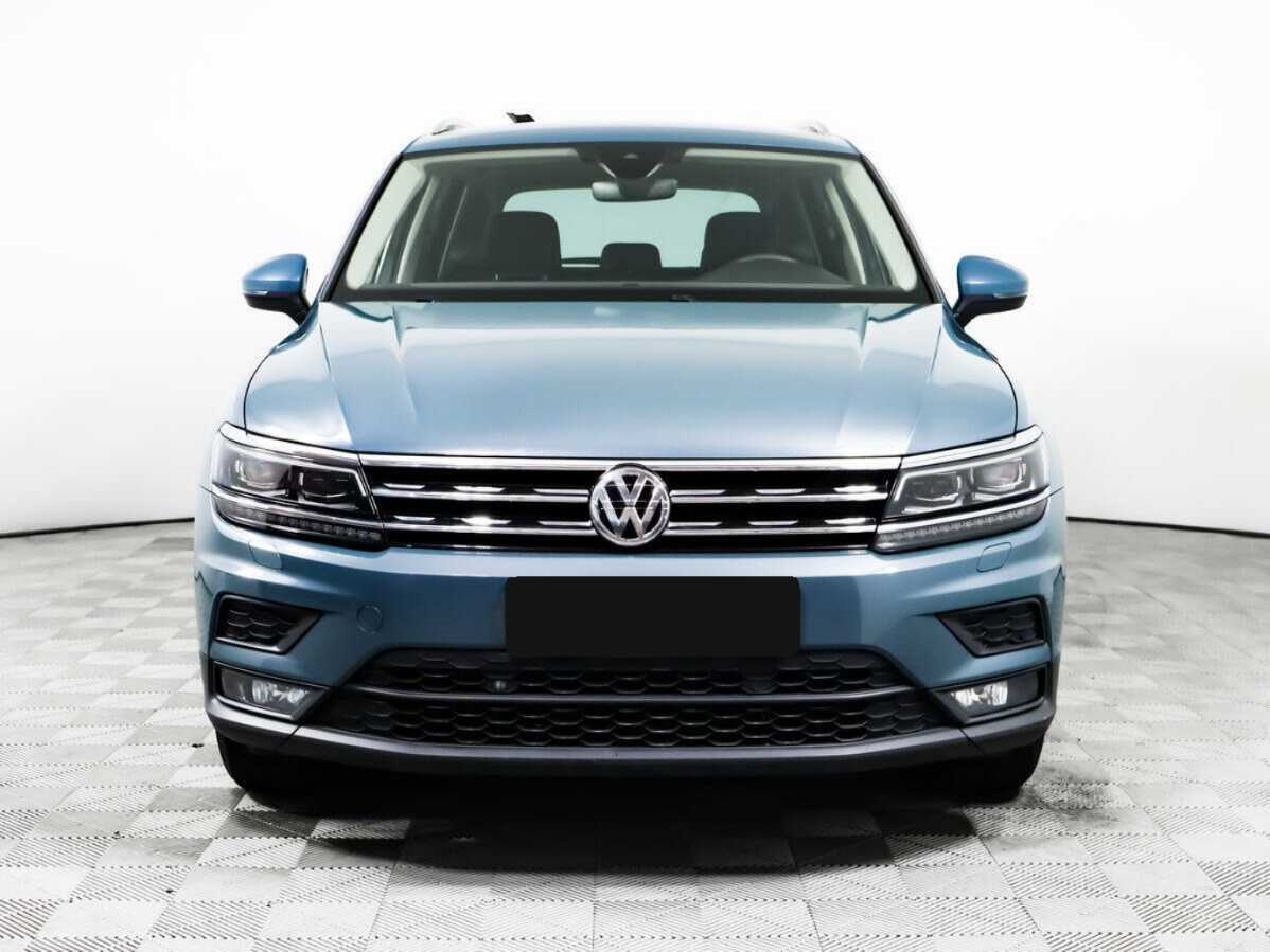 Купить Volkswagen Tiguan с пробегом. Посмотреть фото