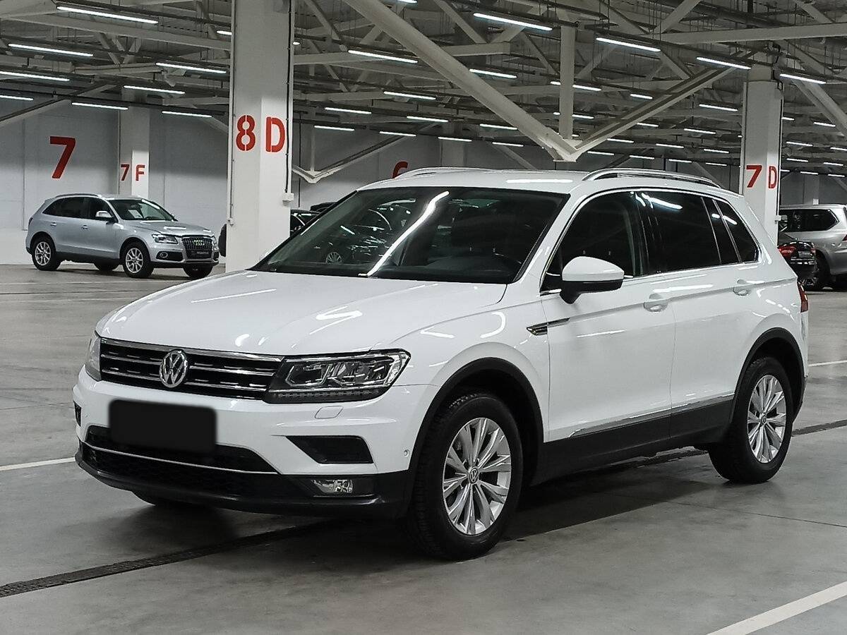 Купить Volkswagen Tiguan с пробегом. Посмотреть фото