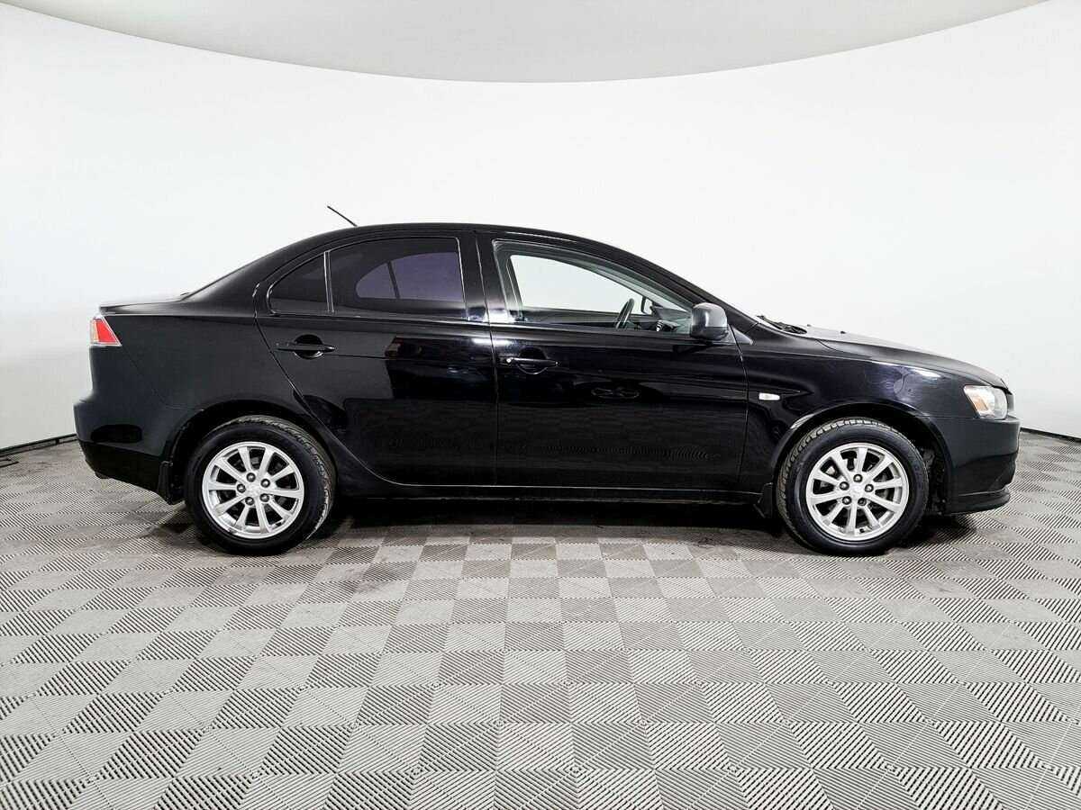 Купить Mitsubishi Lancer с пробегом. Фото: #3
