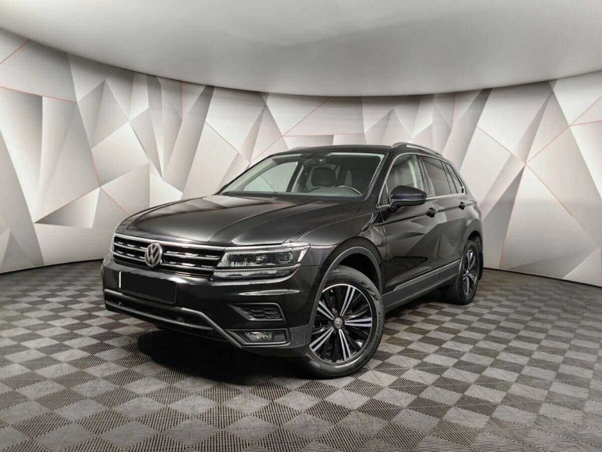 Купить Volkswagen Tiguan с пробегом. Посмотреть фото