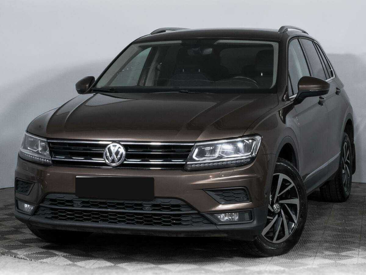 Купить Volkswagen Tiguan с пробегом. Посмотреть фото