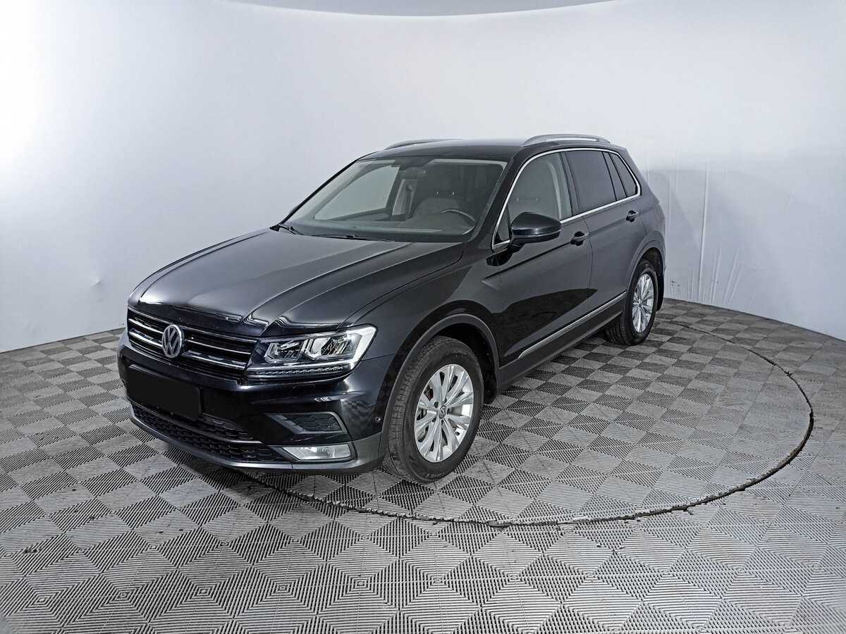 Купить Volkswagen Tiguan с пробегом. Посмотреть фото