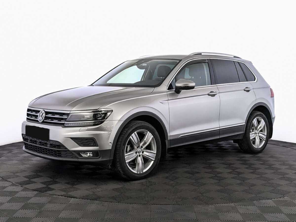 Купить Volkswagen Tiguan с пробегом. Посмотреть фото