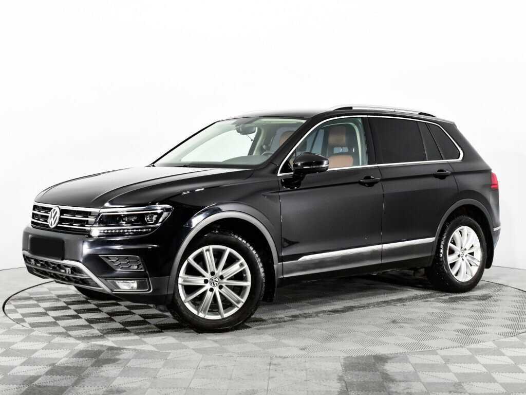 Купить Volkswagen Tiguan с пробегом. Посмотреть фото