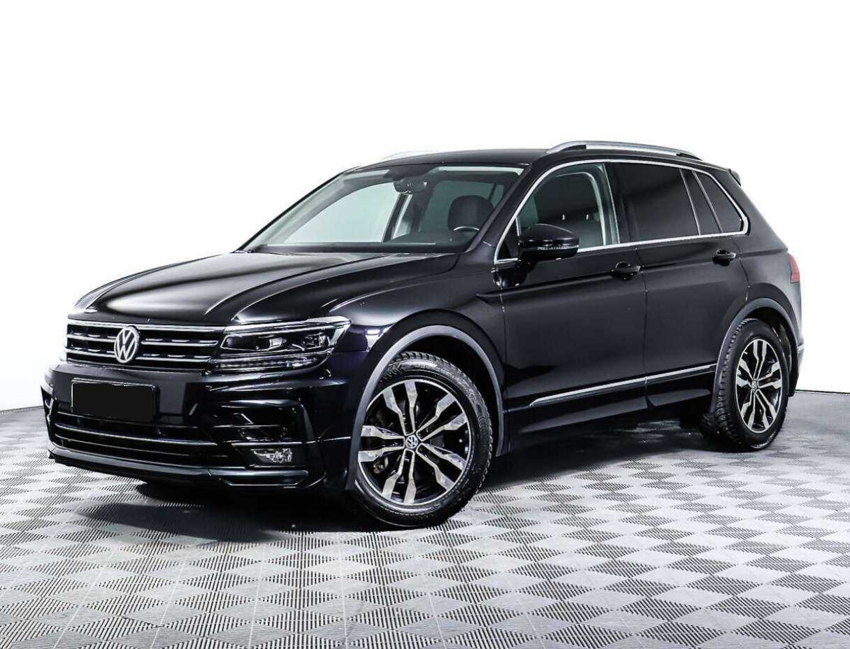 Купить Volkswagen Tiguan с пробегом. Посмотреть фото