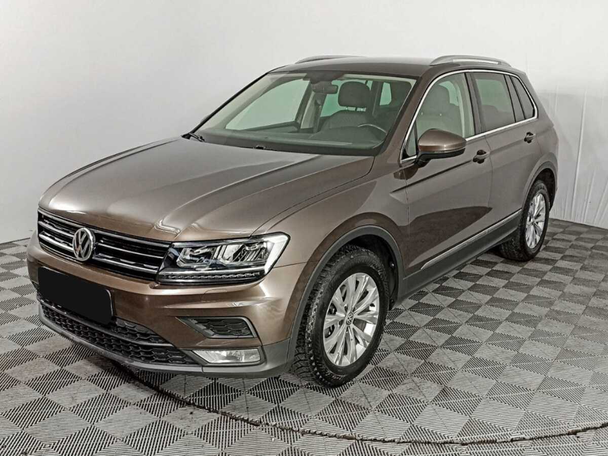 Купить Volkswagen Tiguan с пробегом. Посмотреть фото