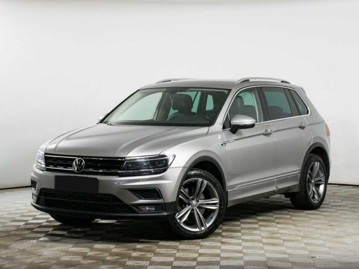 Купить Volkswagen Tiguan с пробегом. Посмотреть фото