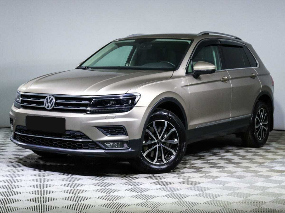 Купить Volkswagen Tiguan с пробегом. Посмотреть фото