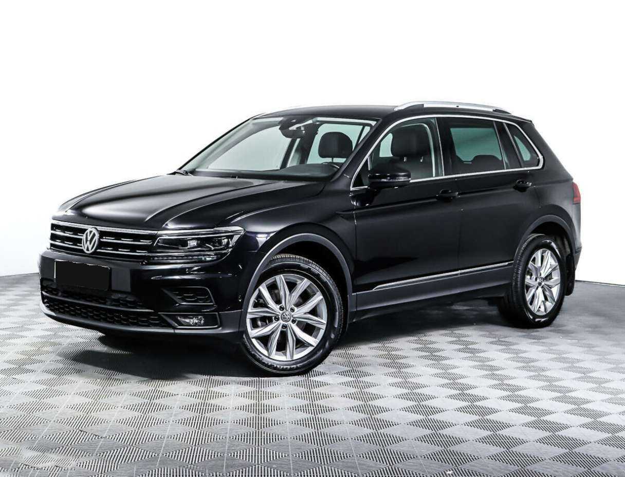 Купить Volkswagen Tiguan с пробегом. Посмотреть фото