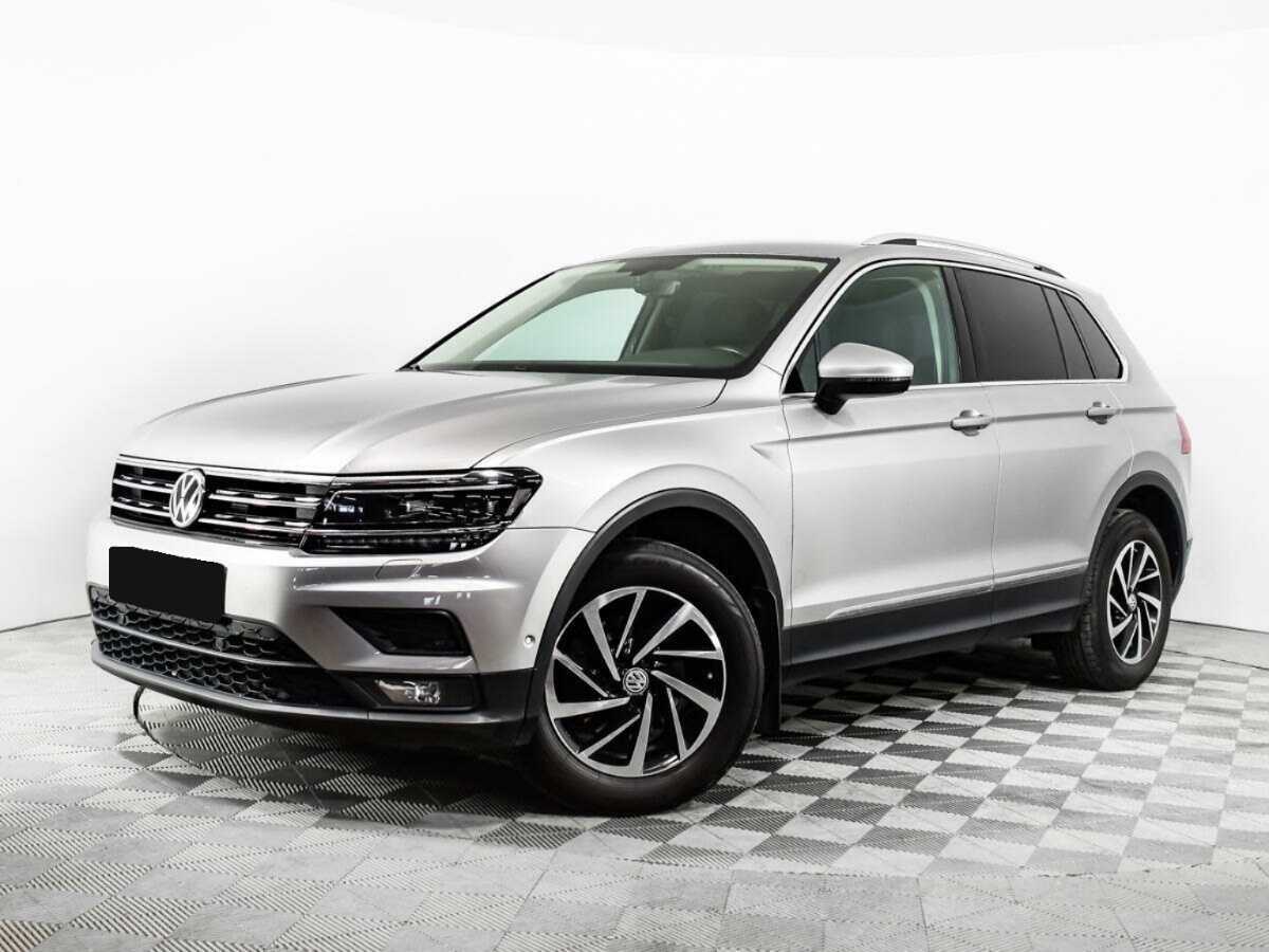 Купить Volkswagen Tiguan с пробегом. Посмотреть фото