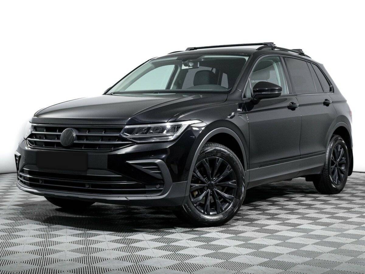 Купить Volkswagen Tiguan с пробегом. Посмотреть фото