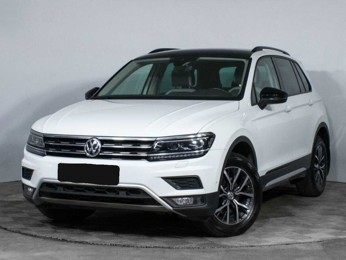 Купить Volkswagen Tiguan с пробегом. Посмотреть фото