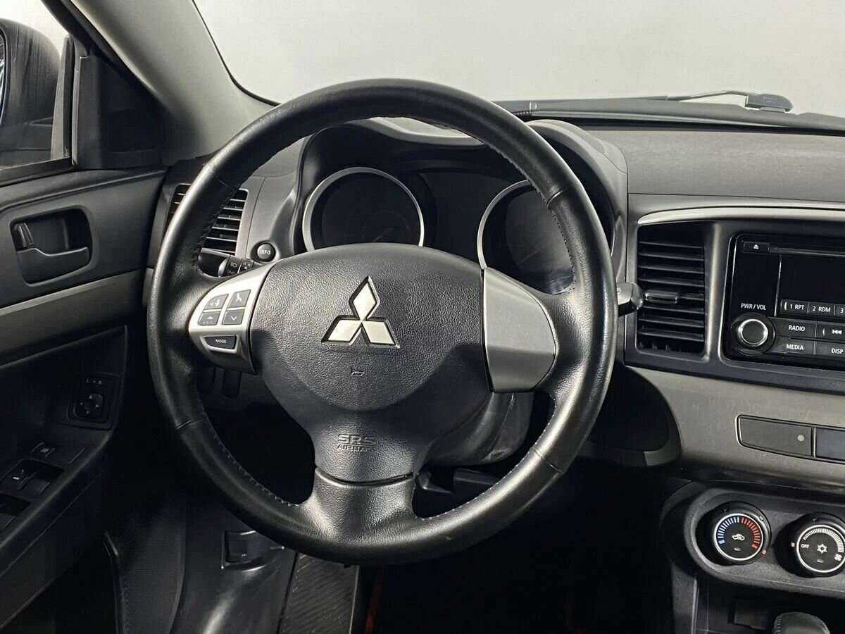 Купить Mitsubishi Lancer с пробегом. Фото: #8