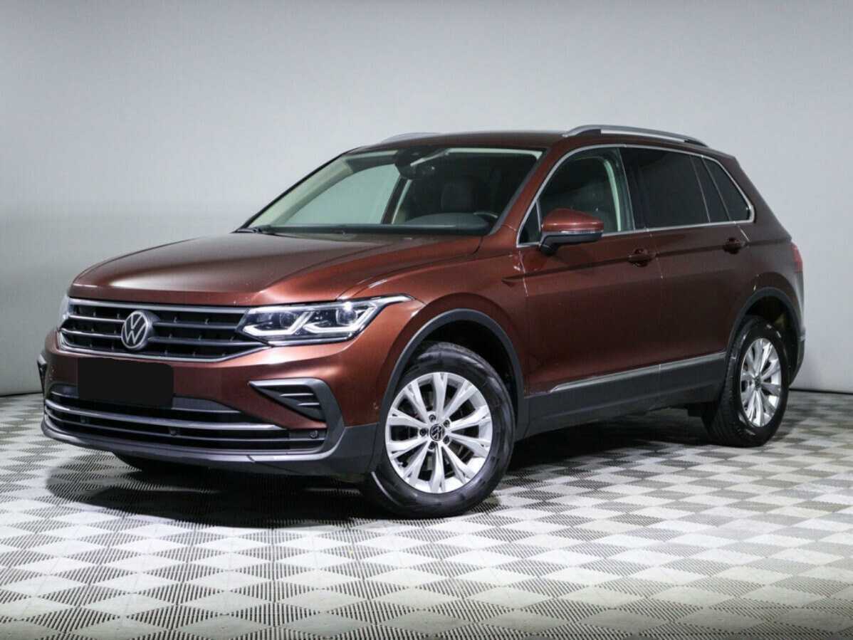Купить Volkswagen Tiguan с пробегом. Посмотреть фото