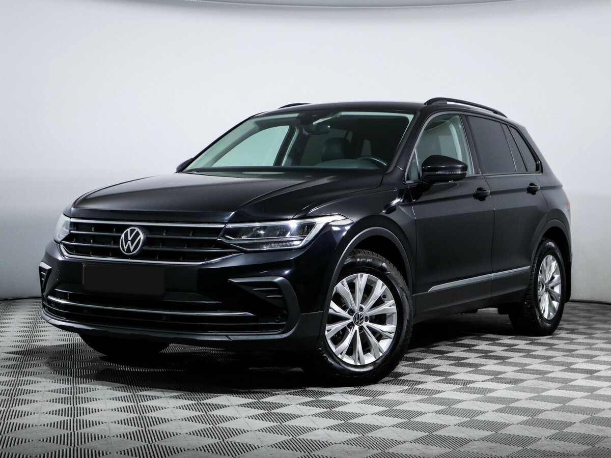 Купить Volkswagen Tiguan с пробегом. Посмотреть фото