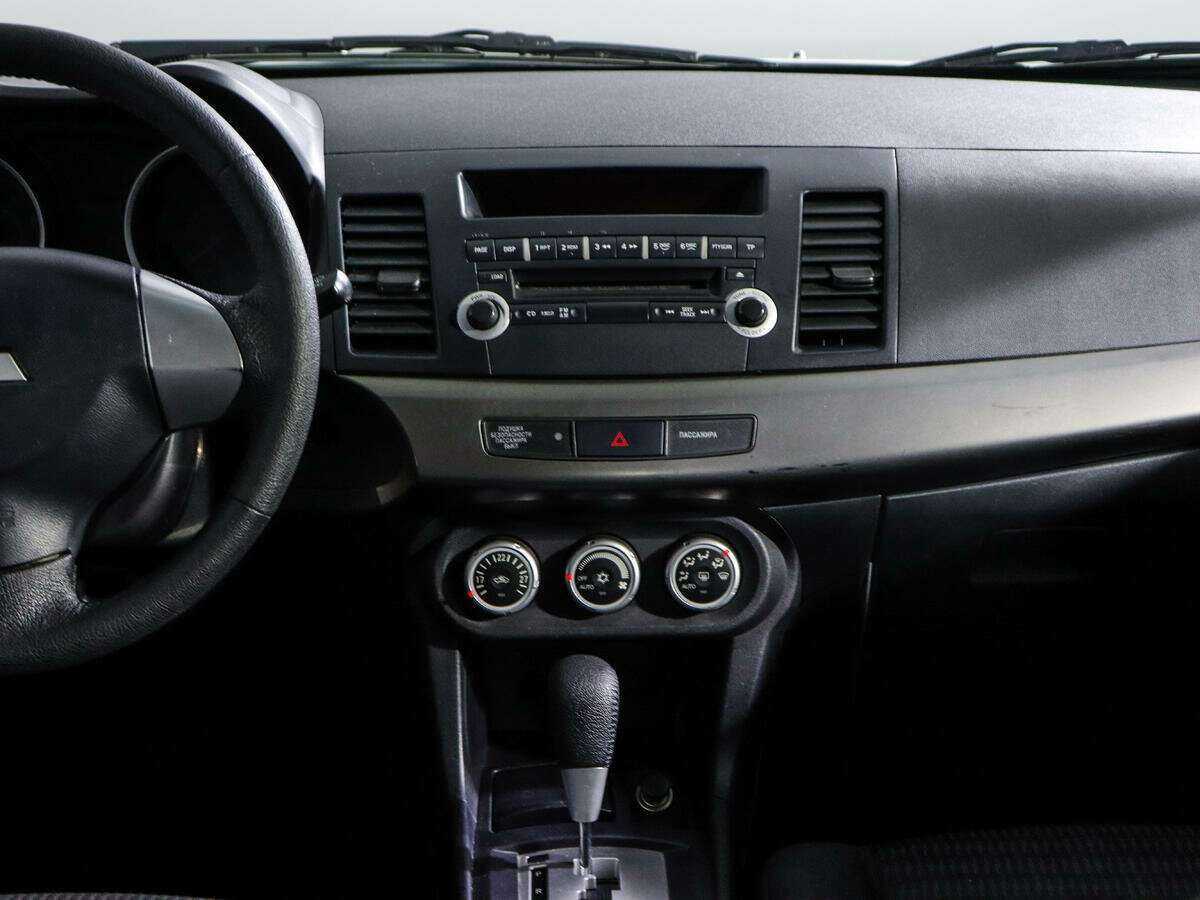 Купить Mitsubishi Lancer с пробегом. Фото: #12