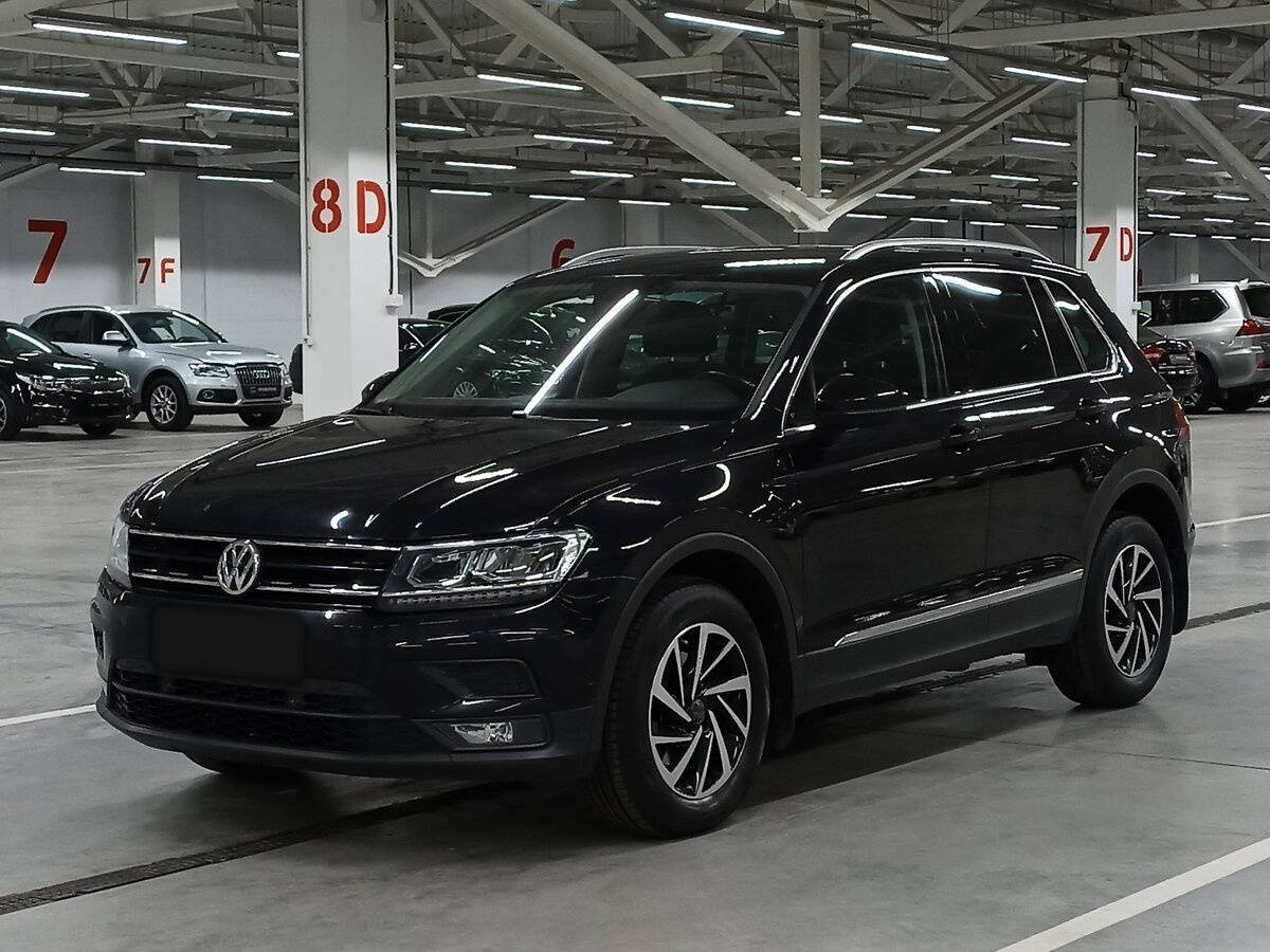 Купить Volkswagen Tiguan с пробегом. Посмотреть фото