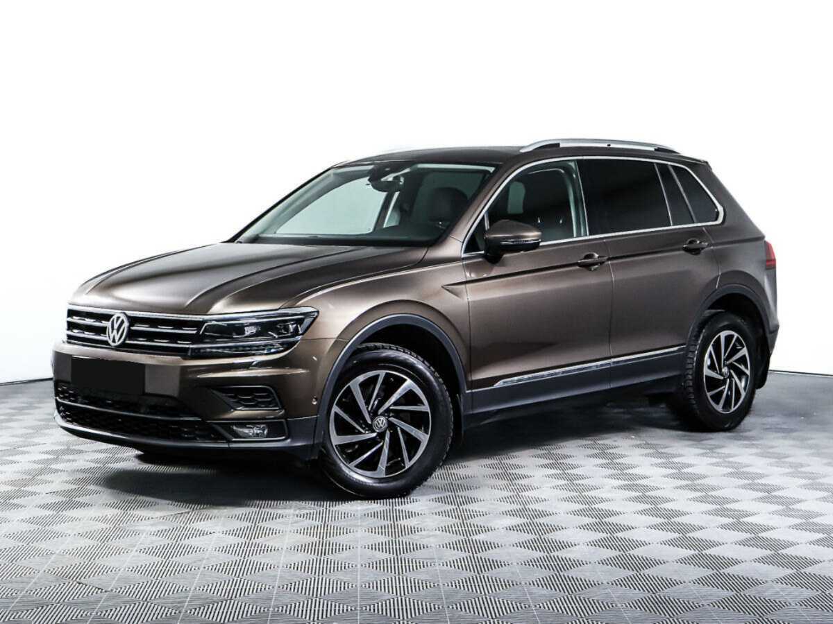 Купить Volkswagen Tiguan с пробегом. Посмотреть фото