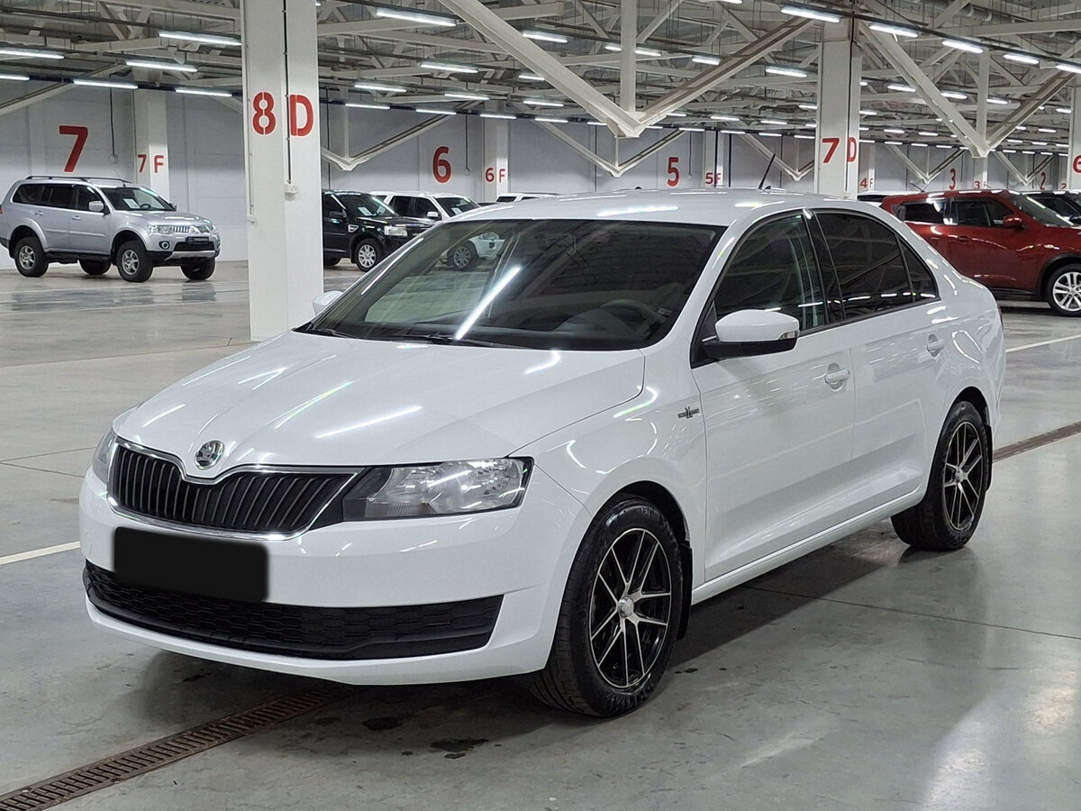 Купить Skoda Rapid с пробегом. Посмотреть фото