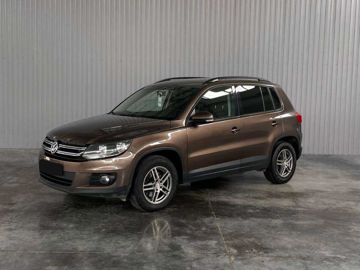 Купить Volkswagen Tiguan с пробегом. Посмотреть фото