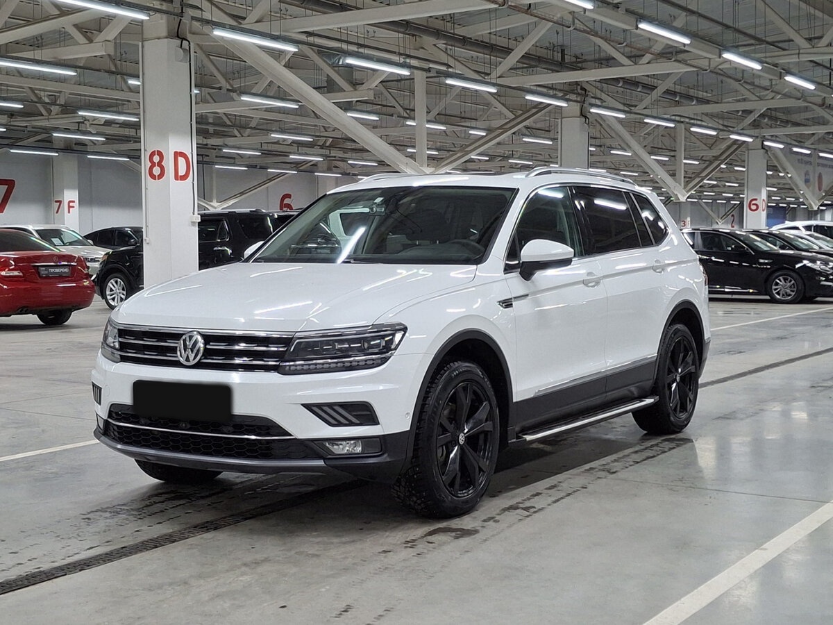 Купить Volkswagen Tiguan с пробегом. Посмотреть фото