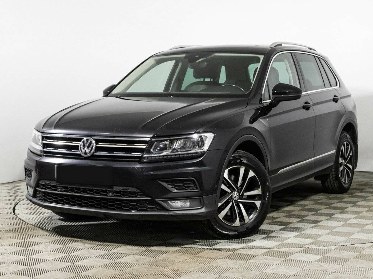 Купить Volkswagen Tiguan с пробегом. Посмотреть фото