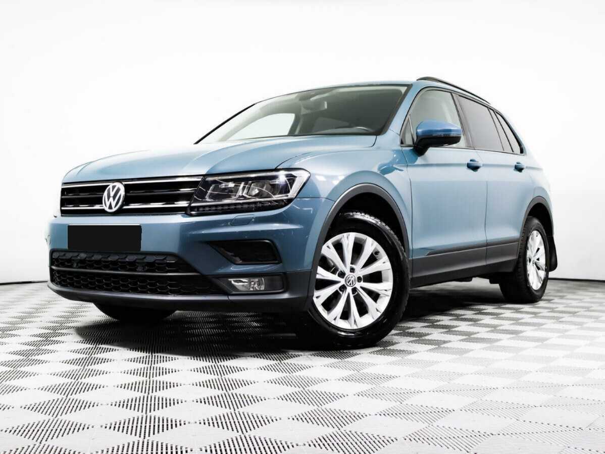 Купить Volkswagen Tiguan с пробегом. Посмотреть фото