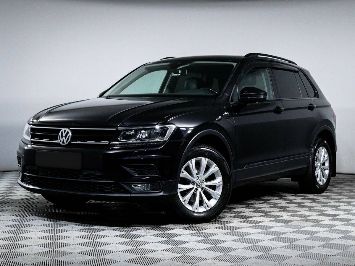 Купить Volkswagen Tiguan с пробегом. Посмотреть фото