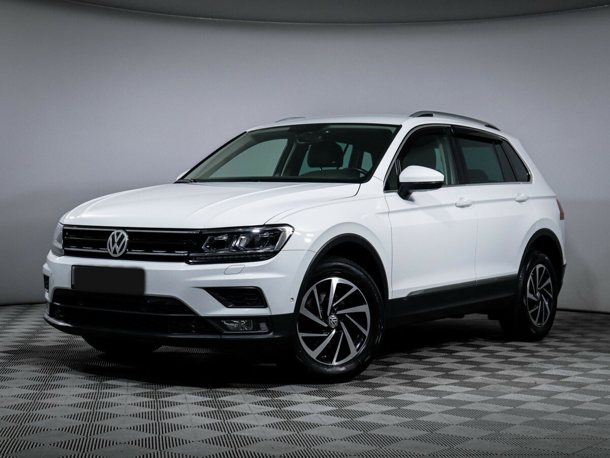 Купить Volkswagen Tiguan с пробегом. Посмотреть фото