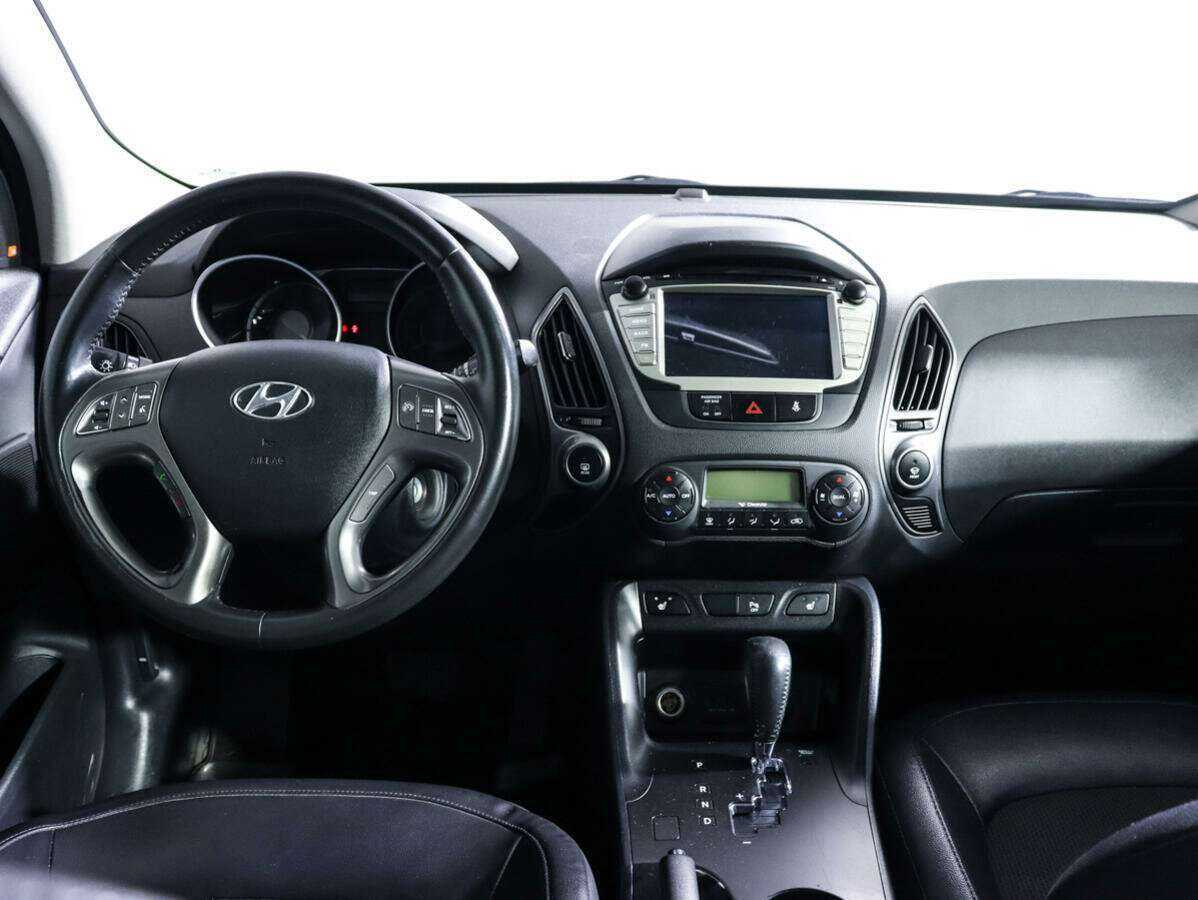 Купить Hyundai ix35 с пробегом. Фото: #11