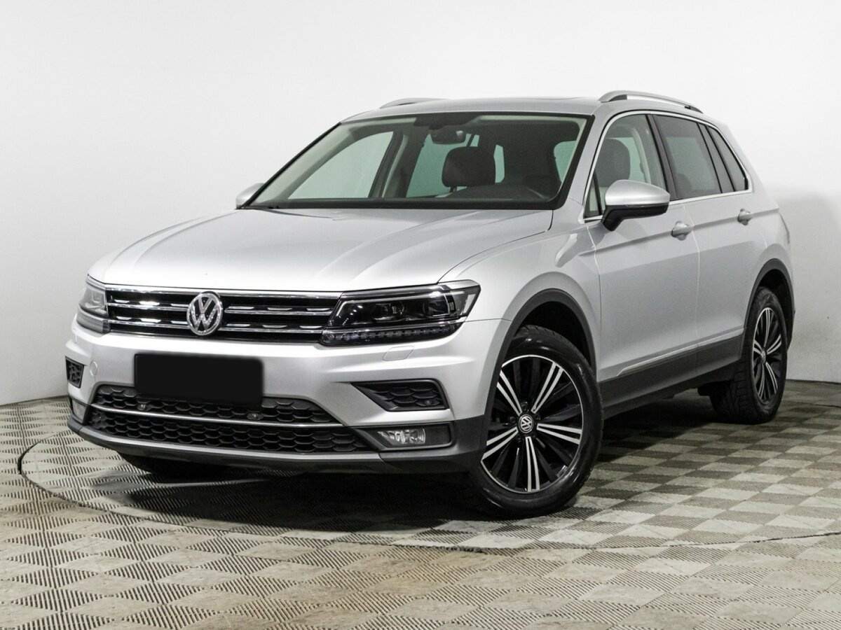 Купить Volkswagen Tiguan с пробегом. Посмотреть фото