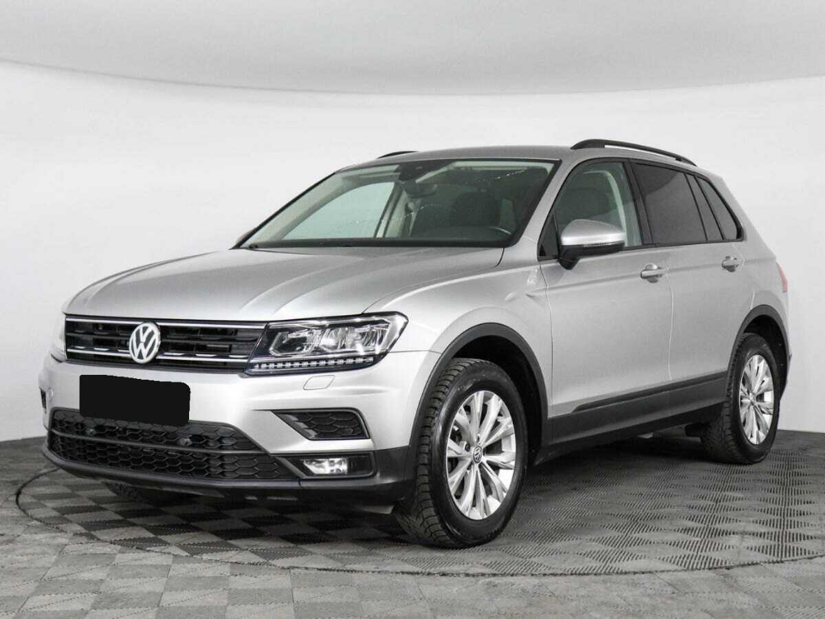 Купить Volkswagen Tiguan с пробегом. Посмотреть фото
