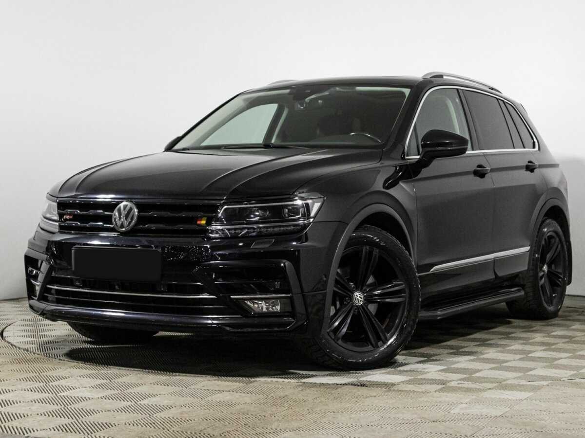Купить Volkswagen Tiguan с пробегом. Посмотреть фото