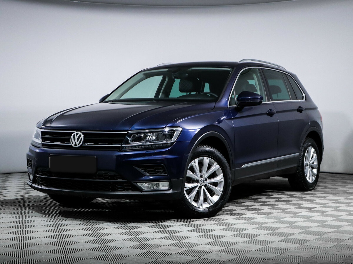 Купить Volkswagen Tiguan с пробегом. Посмотреть фото