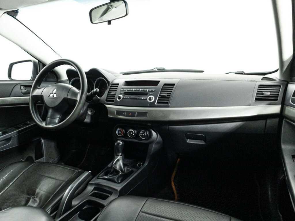 Купить Mitsubishi Lancer с пробегом. Фото: #8