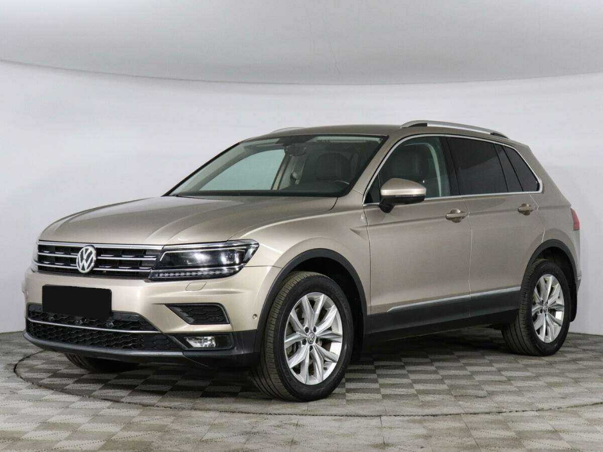 Купить Volkswagen Tiguan с пробегом. Посмотреть фото