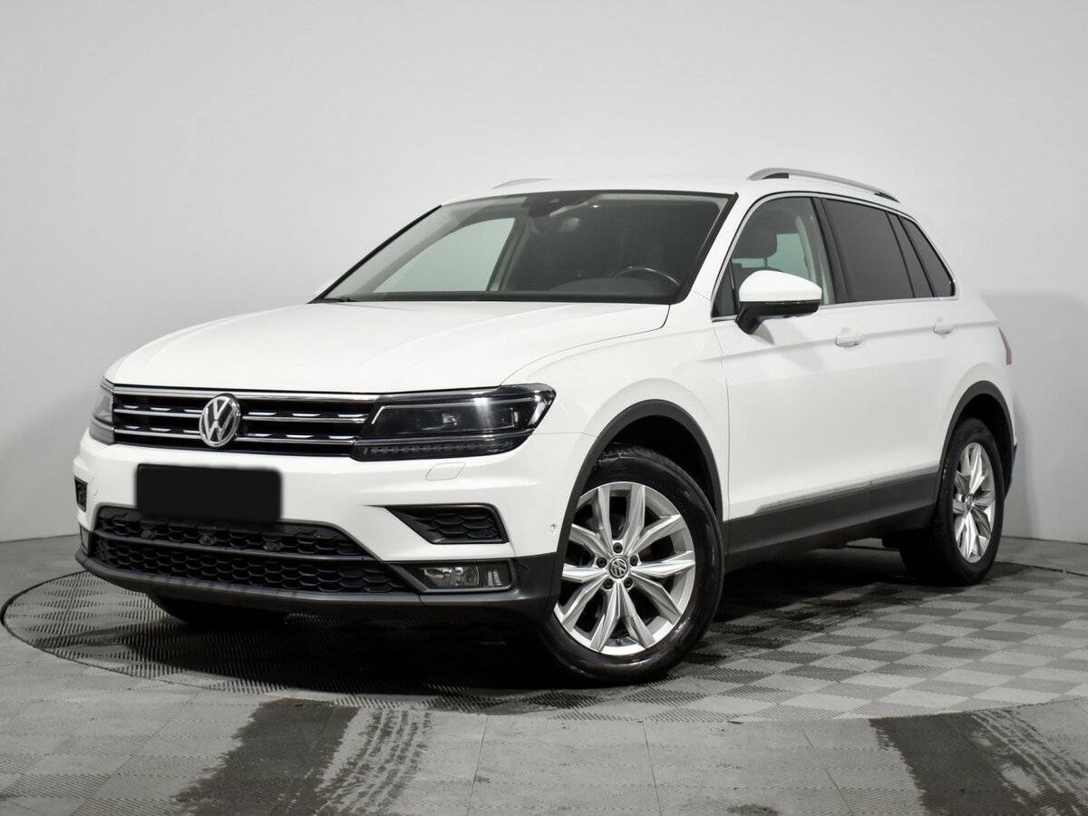 Купить Volkswagen Tiguan с пробегом. Посмотреть фото