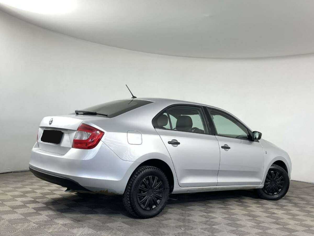 Купить Skoda Rapid с пробегом. Фото: #4