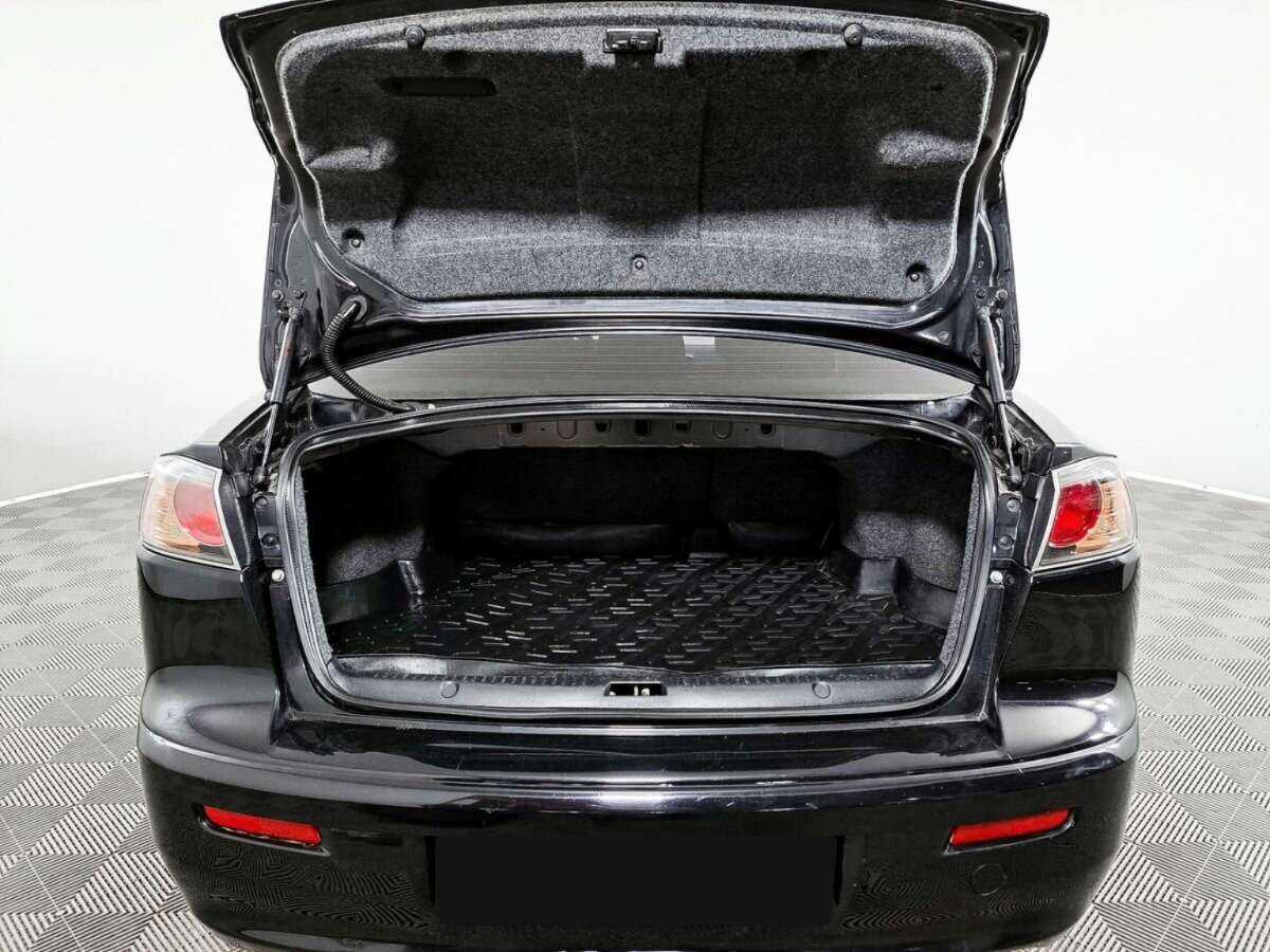 Купить Mitsubishi Lancer с пробегом. Фото: #8