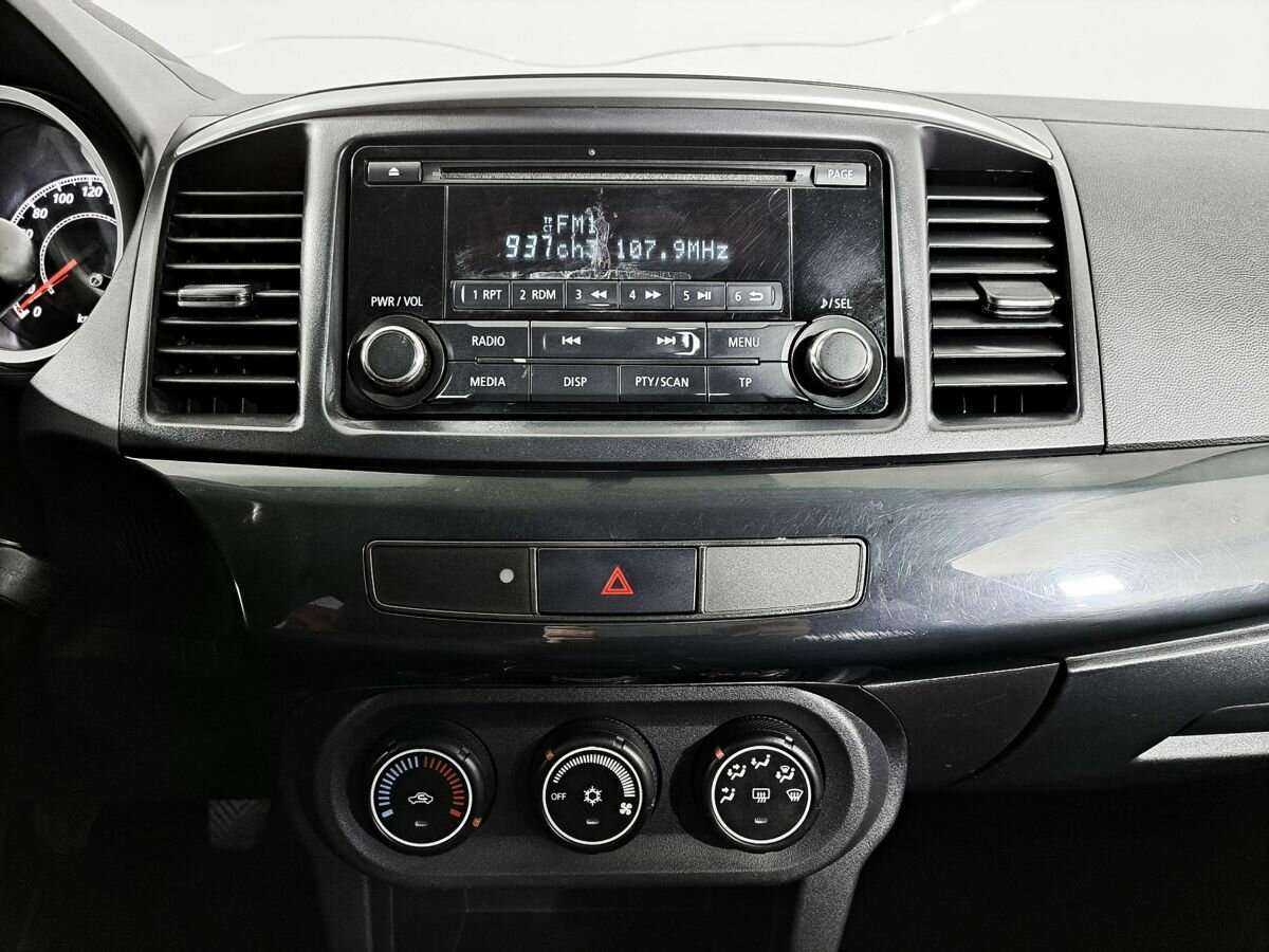 Купить Mitsubishi Lancer с пробегом. Фото: #13